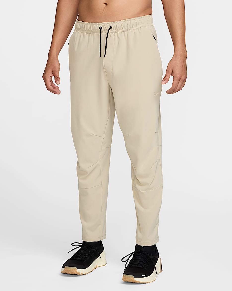 Nike Unlimited Men's Dri-FIT Tapered-Leg Versatile Trousers - Desert Khaki/Black/Desert Khaki