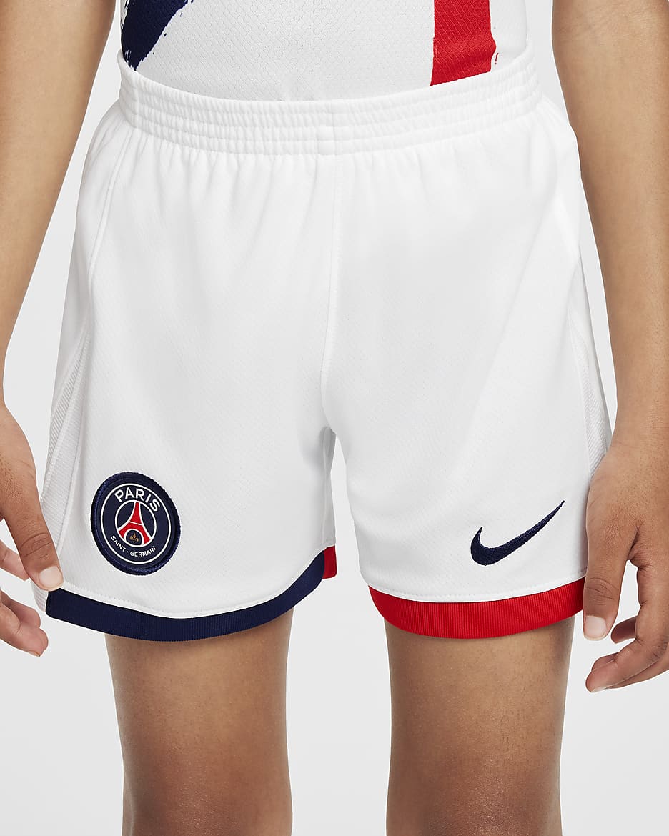 Conjunto de três peças de futebol de réplica Nike do equipamento alternativo Stadium Paris Saint-Germain 2024/25 para criança - Branco/Midnight Navy/Vermelho University/Midnight Navy