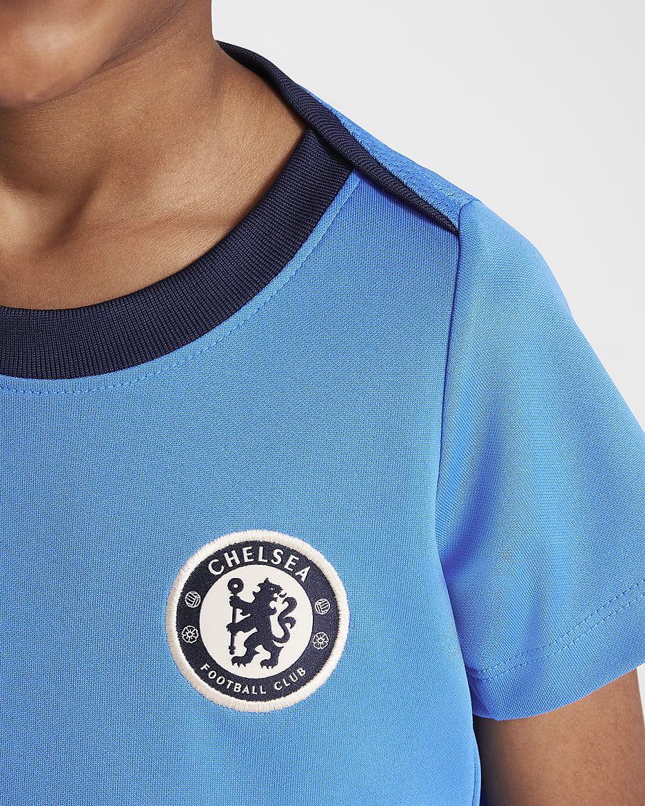 Kortärmad fotbollströja Chelsea FC Academy Pro Nike Dri-FIT för barn - Light Photo Blue/Obsidian/Guava Ice