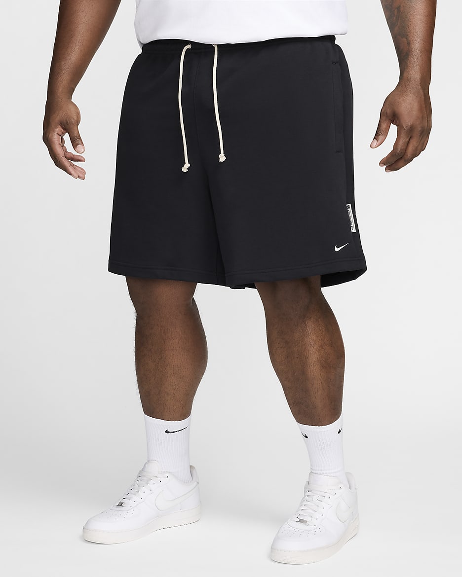 Shorts de básquetbol de tejido Fleece Dri-FIT de 20 cm para hombre Nike Standard Issue - Negro/Marfil pálido