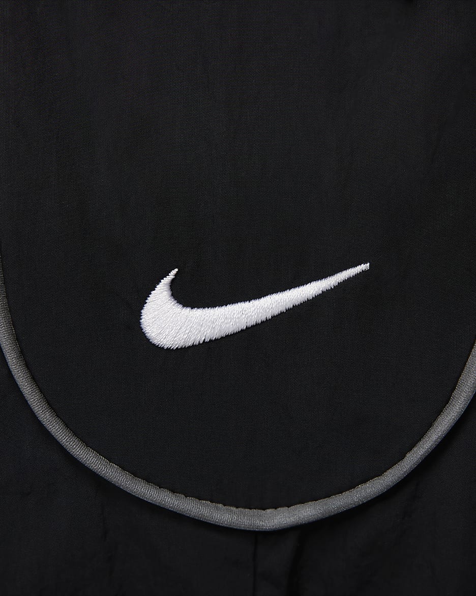 Męskie spodnie dresowe Nike Solo Swoosh - Czerń/Biel