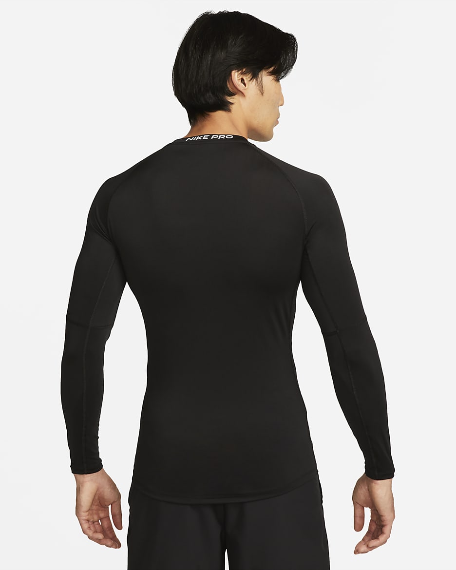 Nike Pro Dri-FIT tettsittende, langermet treningsoverdel til herre - Svart/Hvit