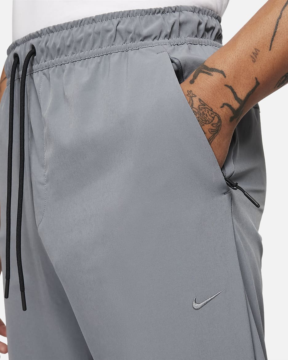 Nike Unlimited Men's Dri-FIT Tapered Leg Versatile Pants