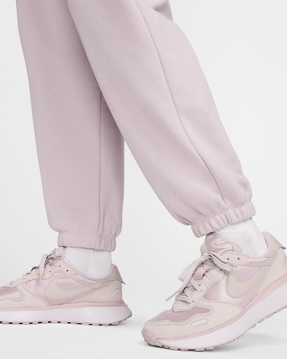 Pants de entrenamiento oversized de tiro medio para mujer Nike Sportswear Club Fleece - Violeta platino/Blanco