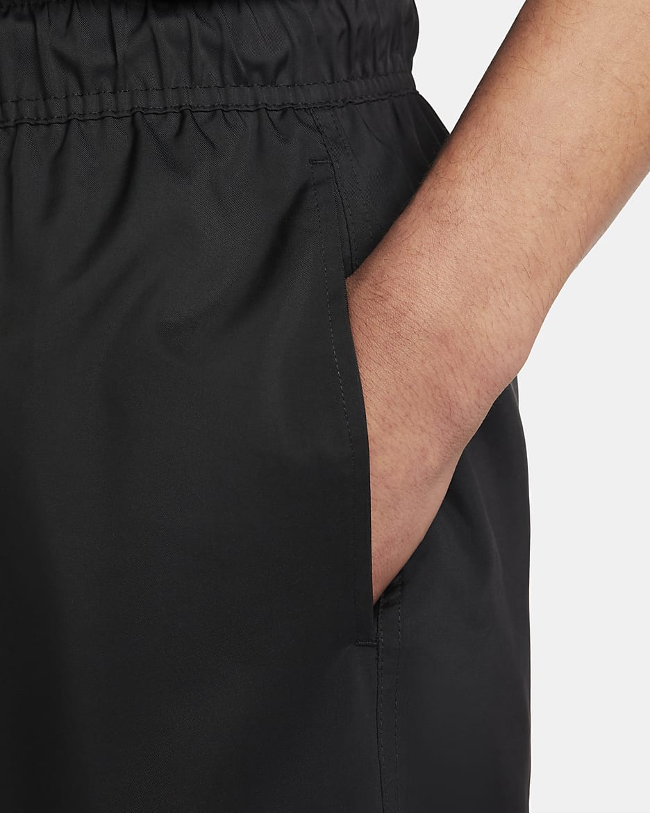 Shorts Flow in tessuto Nike Club – Uomo - Nero/Bianco