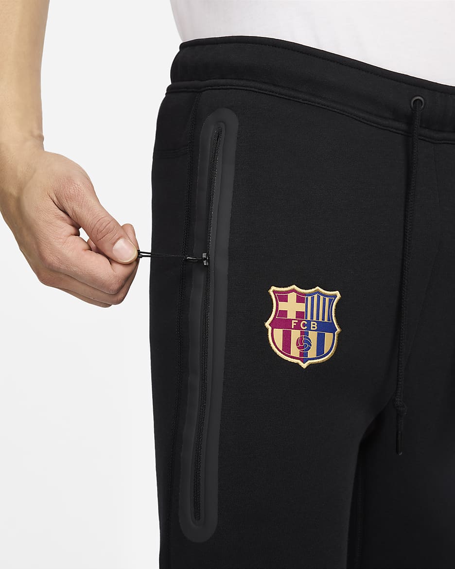 Calças desportivas de futebol Nike Tech Fleece FC Barcelona para homem - Preto/Dourado Club