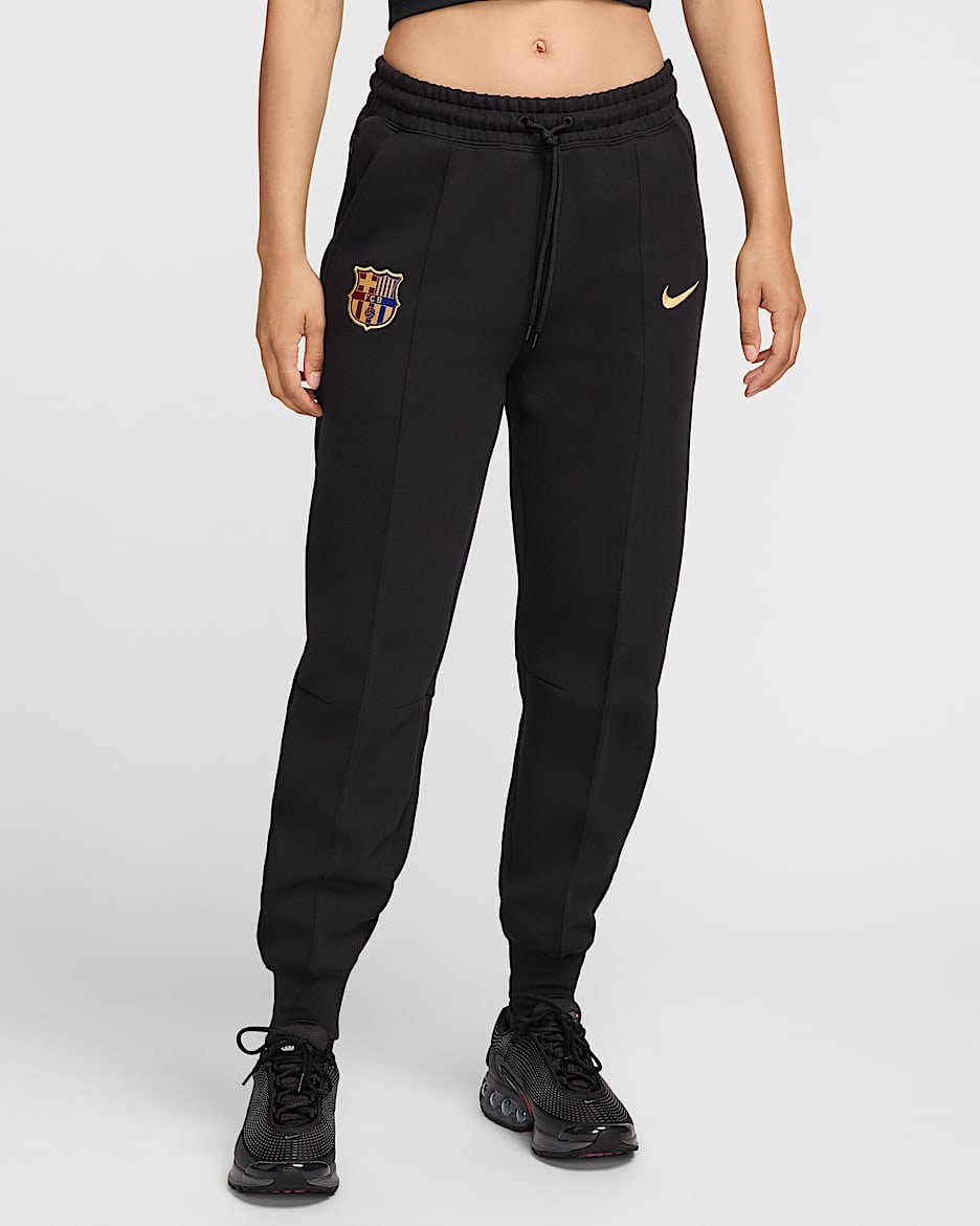 FC Barcelona Tech Fleece Nike voetbaljoggingbroek met halfhoge taille voor dames - Zwart/Club Gold