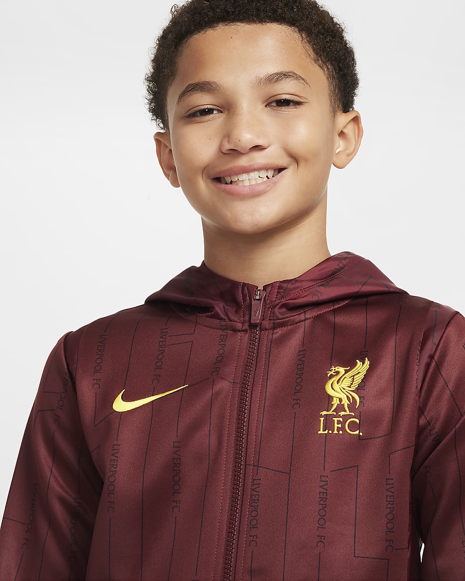 FC Liverpool Home Nike Football Tracksuit aus Webmaterial (ältere Kinder) - Dark Team Red/Chrome Yellow