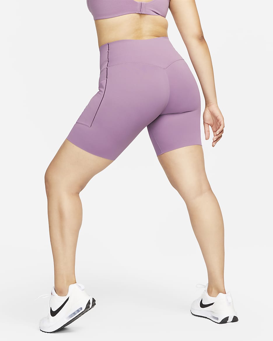 Shorts de ciclismo con bolsillos de 20 cm de tiro alto y media sujeción para mujer Nike Universa - Polvo violeta/Negro