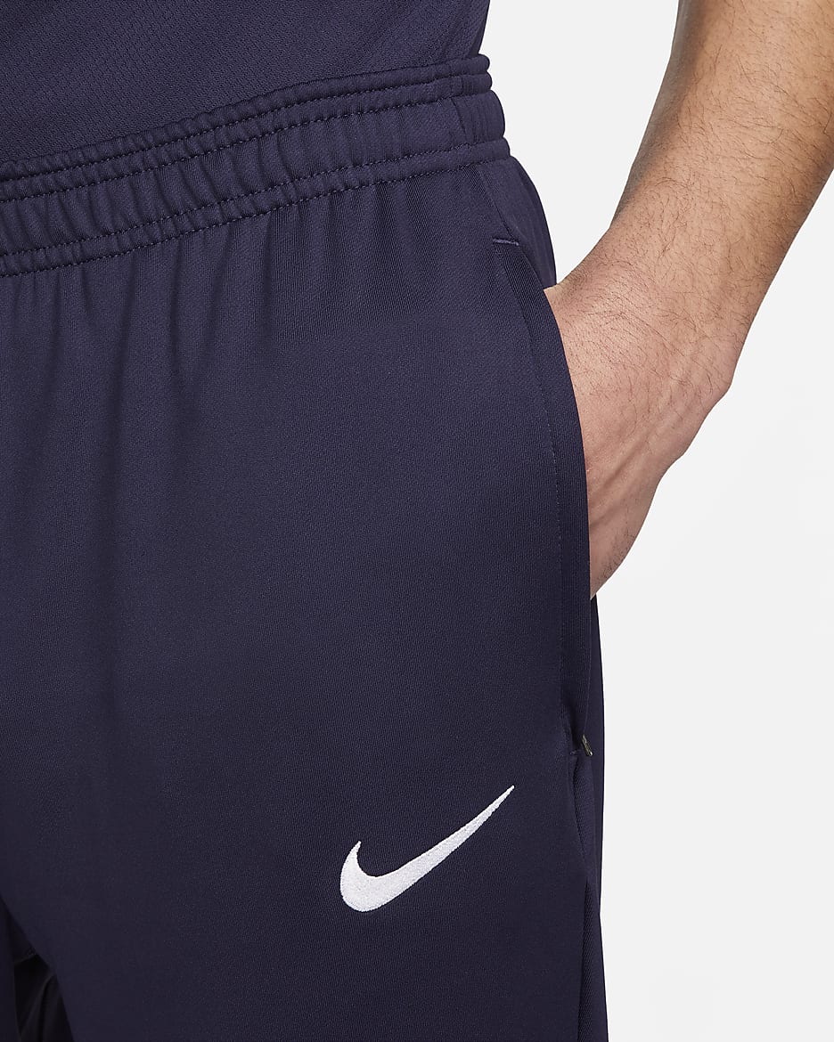 Pantalon de foot en maille Nike Dri-FIT Angleterre Strike pour homme - Purple Ink/Rosewood/Blanc