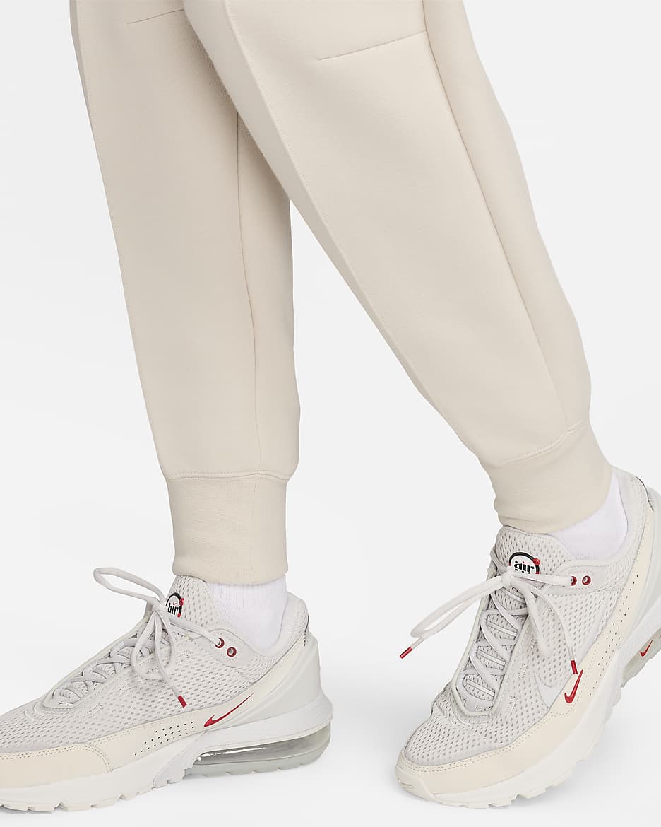 Pantaloni jogger a vita media Nike Sportswear Tech Fleece – Donna - Light Orewood Brown