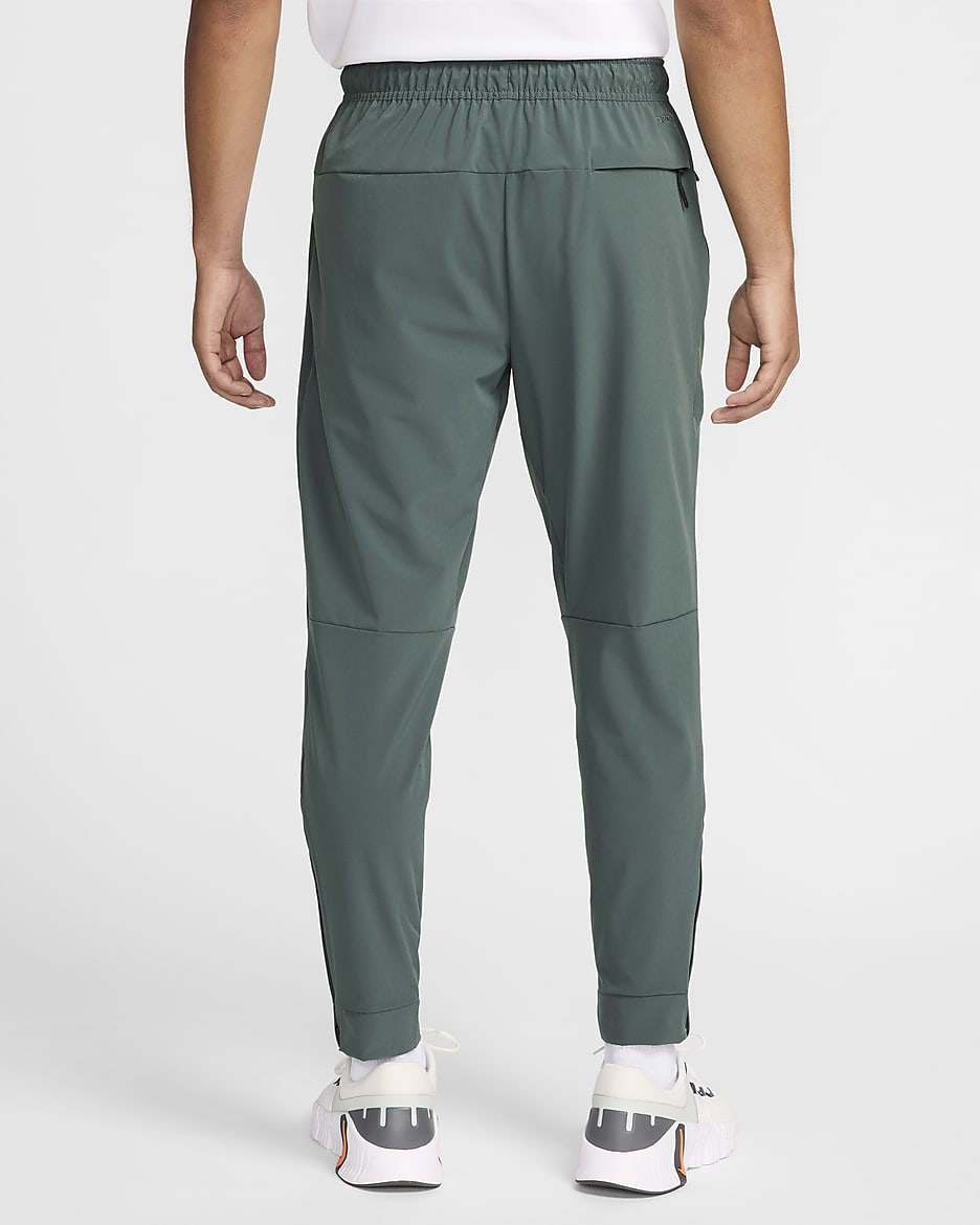 Pantalon avec ouvertures à zip Nike Dri-FIT Unlimited pour homme - Vintage Green/Noir/Vintage Green