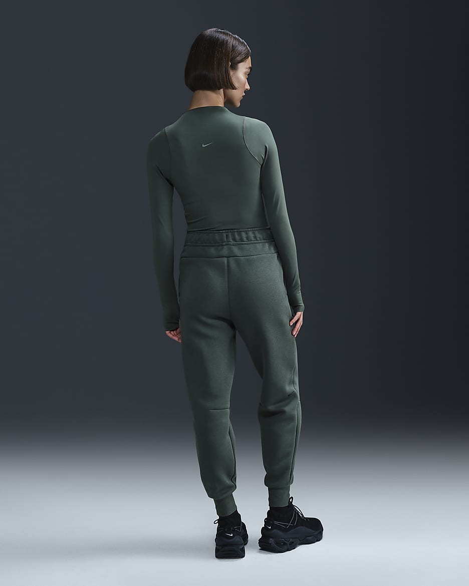 Pantaloni jogger a vita media Nike Sportswear Tech Fleece – Donna - Vintage Green/Nero