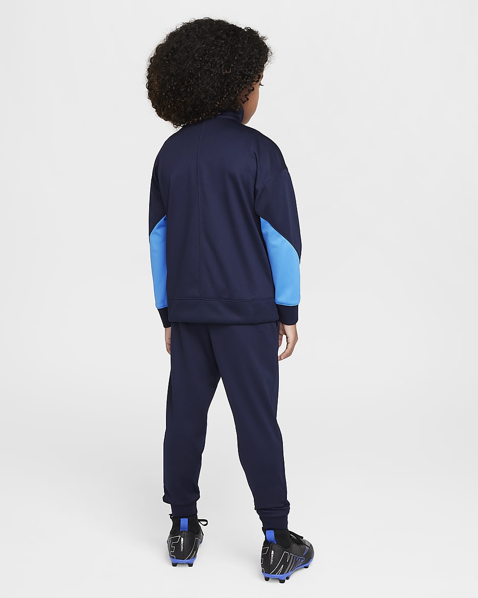 Tuta da calcio in maglia Nike Dri-FIT Chelsea FC Strike – Bambino/a - Ossidiana/Light Photo Blue/Guava Ice