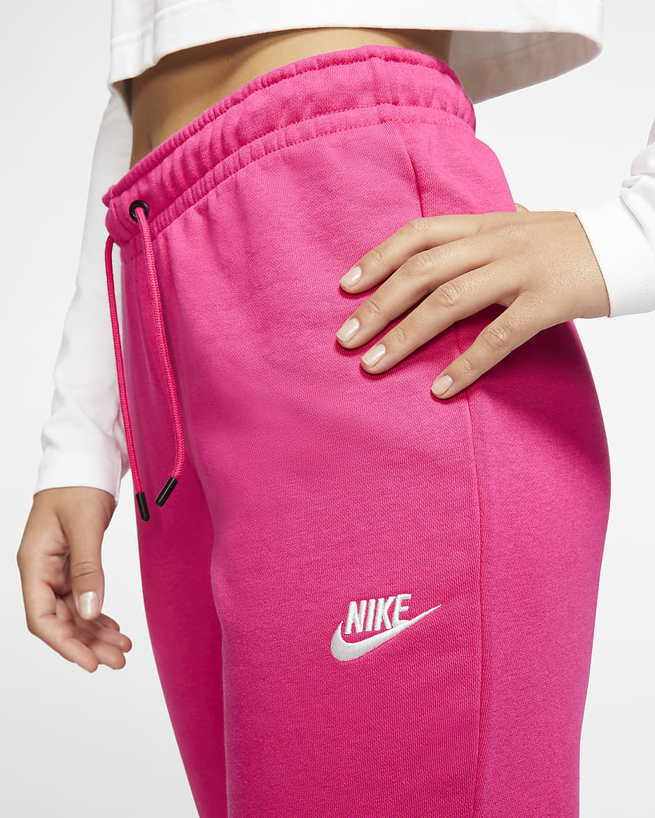 Pantaloni in fleece a vita media Nike Sportswear Essentials - Donna - Watermelon/Bianco