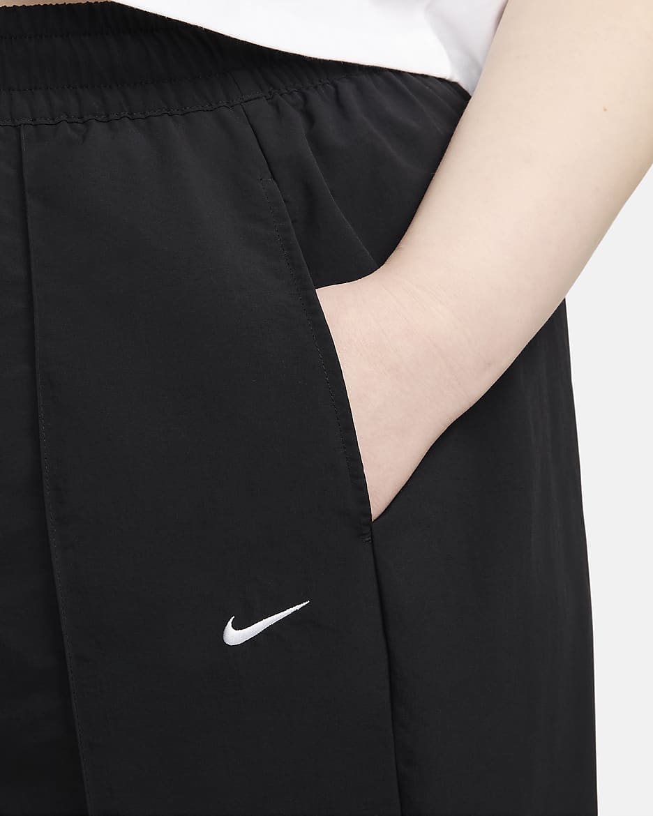 Pants de tiro medio con dobladillo abierto para mujer (talla grande) Nike Sportswear Everything Wovens - Negro/Blanco