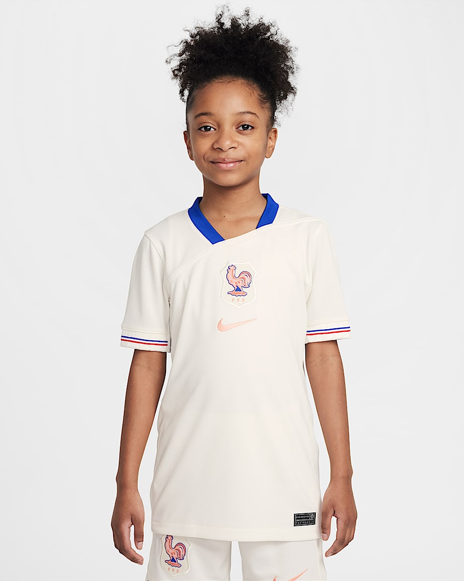 Koszulka piłkarska dla dużych dzieci Nike Dri-FIT FFF Stadium 2025 (drużyna kobiet) (wersja wyjazdowa) – replika - Pale Ivory/Bright Blue/Light Madder Root