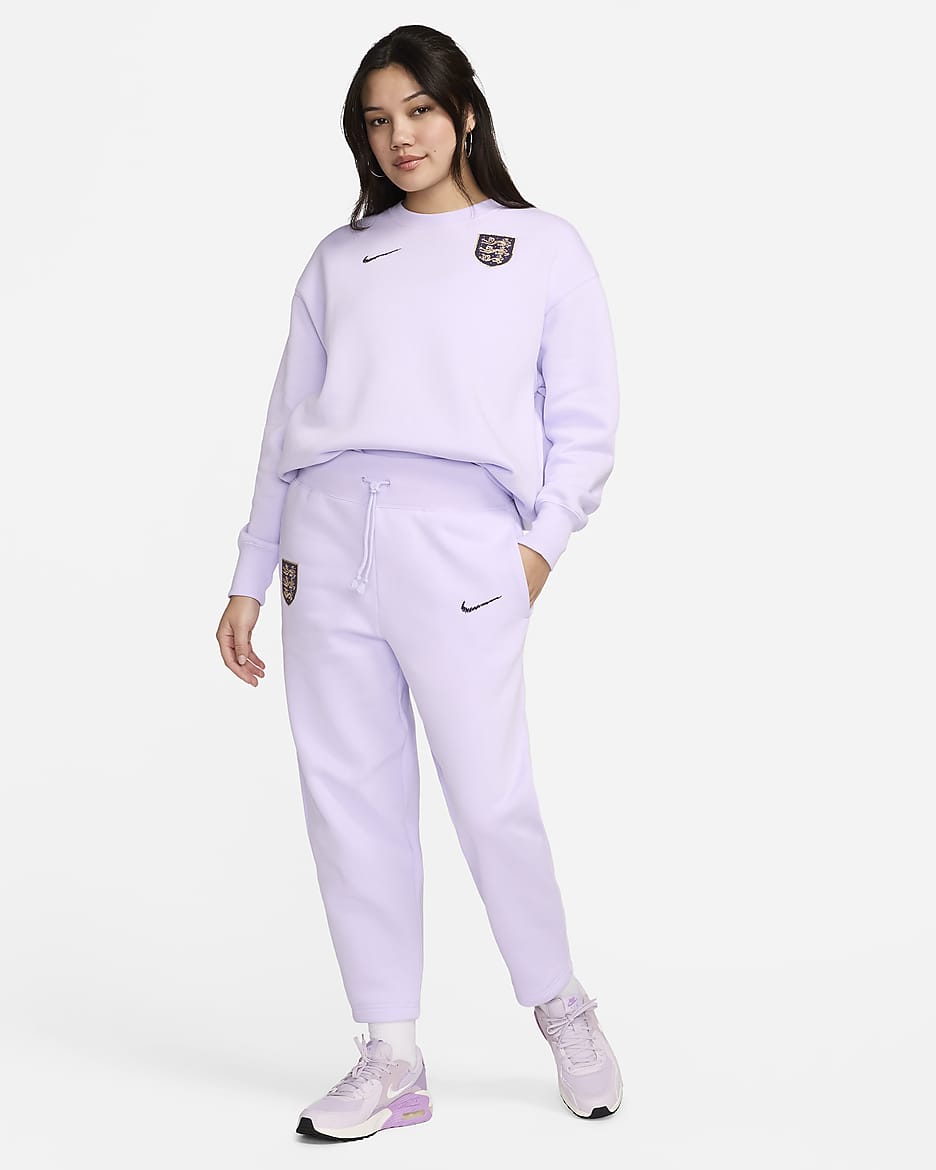 Pantaloni Curve da calcio a vita alta Nike Inghilterra Phoenix Fleece – Donna - Violet Mist/Dark Raisin