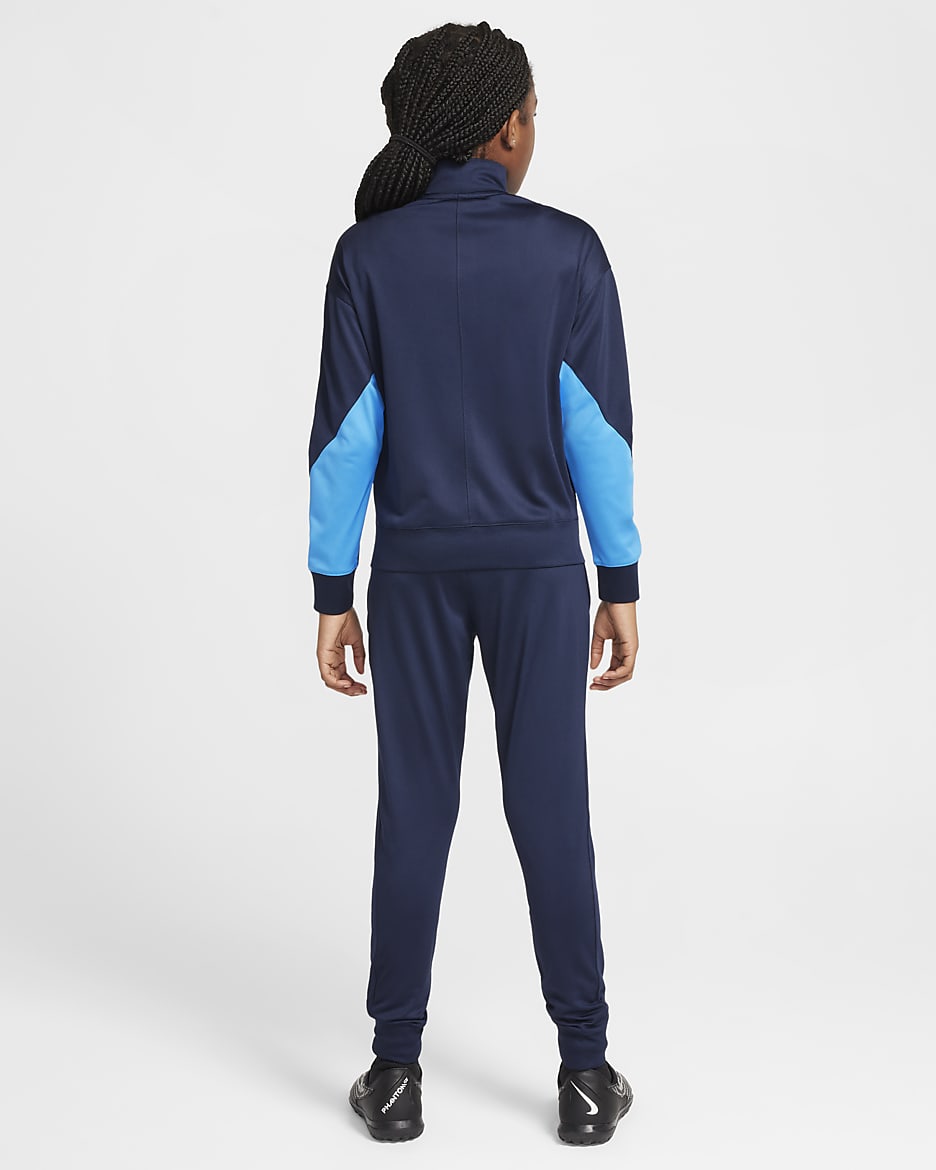 Chelsea F.C. Strike Older Kids' Nike Dri-FIT Football Knit Tracksuit - Obsidian/Light Photo Blue/Guava Ice