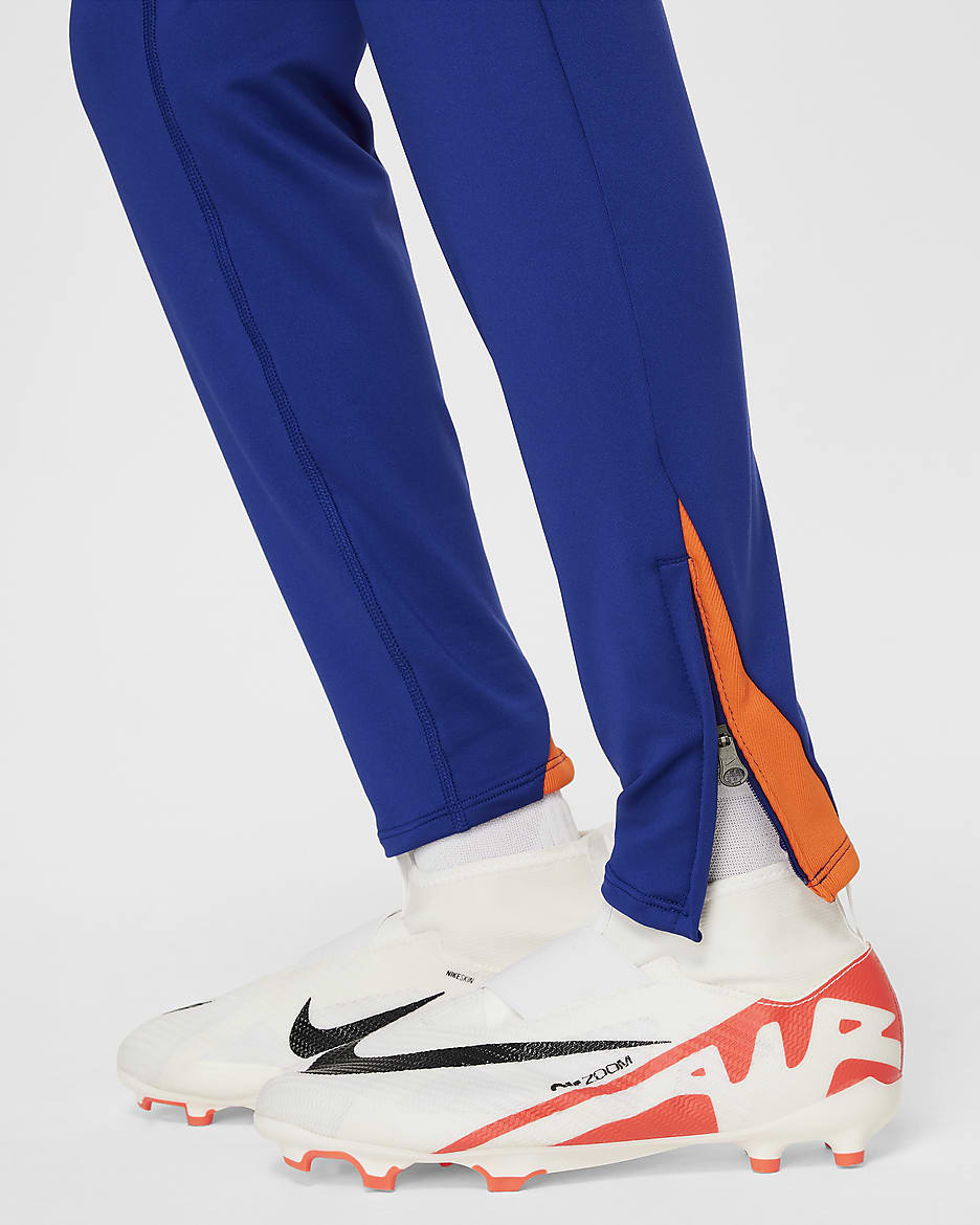 Países Bajos Strike Pantalón de fútbol de tejido Knit Nike Dri-FIT - Niño/a - Deep Royal Blue/Safety Orange/Safety Orange