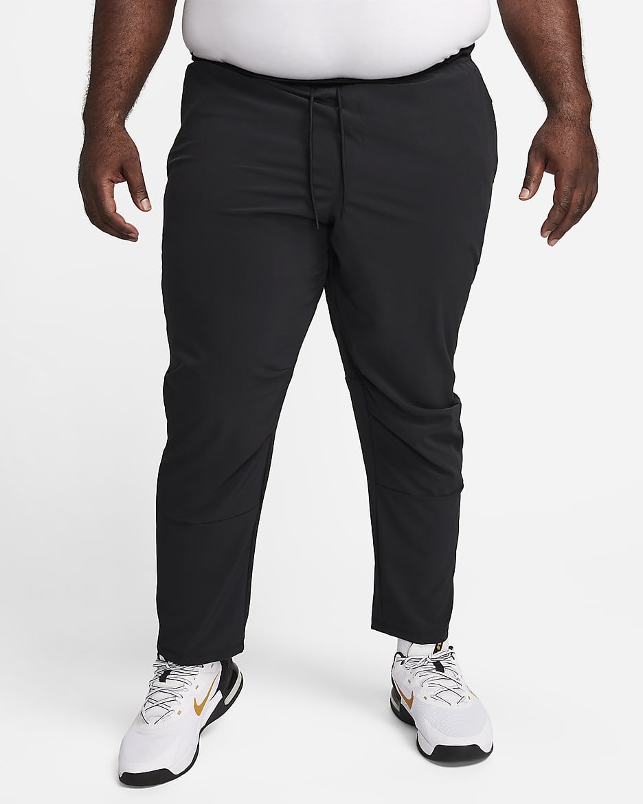 Nike Unlimited Men's Dri-FIT Tapered Leg Versatile Pants - Black/Black/Black