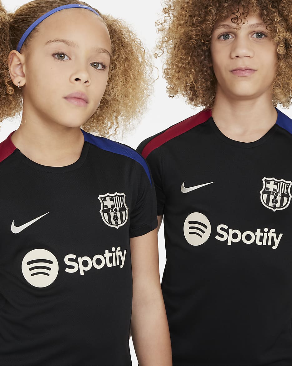 FC Barcelona Strike Nike Dri-FIT knit voetbaltop met korte mouwen voor kids - Zwart/Noble Red/Deep Royal Blue/Light Orewood Brown