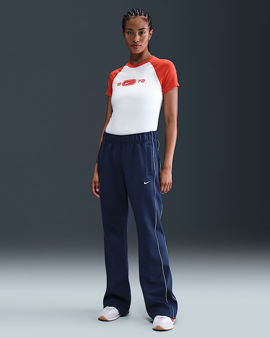 Pants de tejido Knit slim de tiro medio para mujer Nike Sportswear Windrunner - Azul marino medianoche/Vela/Vela