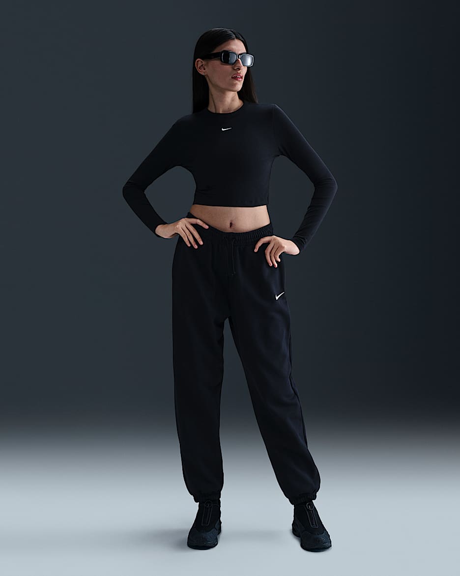 Pants de entrenamiento de French Terry oversized de tiro alto para mujer Nike Sportswear Phoenix Fleece - Negro/Vela