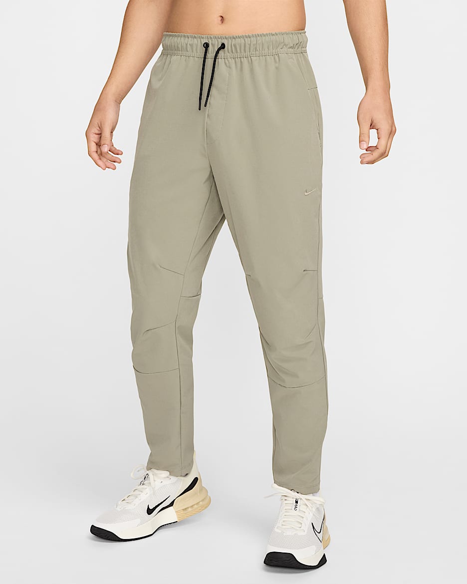 Nike Unlimited Men's Dri-FIT Tapered Leg Versatile Pants - Light Army/Black/Light Army