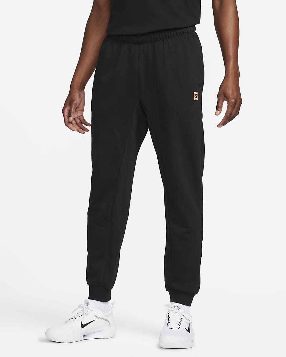 Calças de ténis em tecido moletão NikeCourt Heritage para homem - Preto