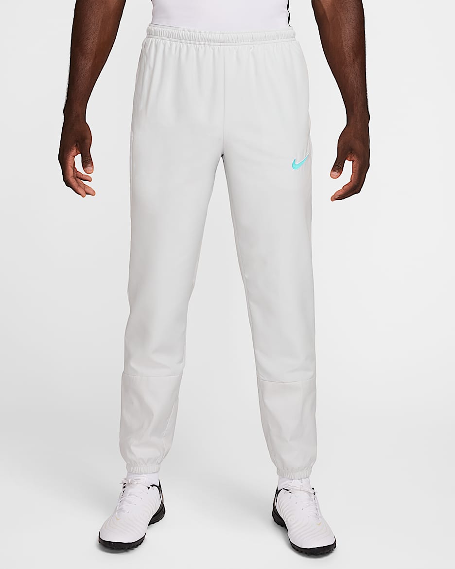 Pants de fútbol Repel para hombre Nike Academy+ - Polvo fotón/Turquesa dinámico