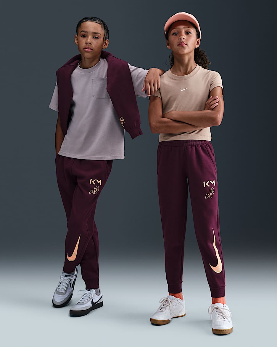 Kylian Mbappé Club Fleece Older Kids' Nike Football Joggers - Bordeaux/Orange Pulse/Melon Tint