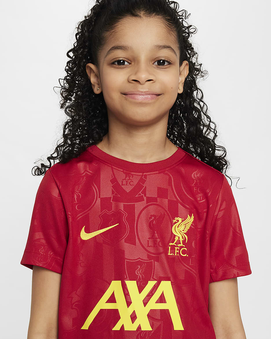 Liverpool F.C. Academy Pro Older Kids' Nike Dri-FIT Football Pre-Match Short-Sleeve Top - Gym Red/Chrome Yellow/Chrome Yellow