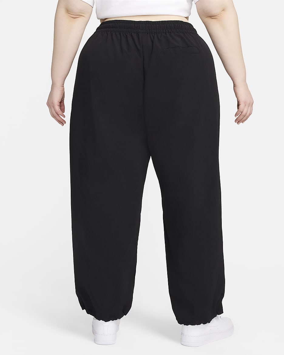 Pants de tiro medio con dobladillo abierto para mujer (talla grande) Nike Sportswear Everything Wovens - Negro/Blanco