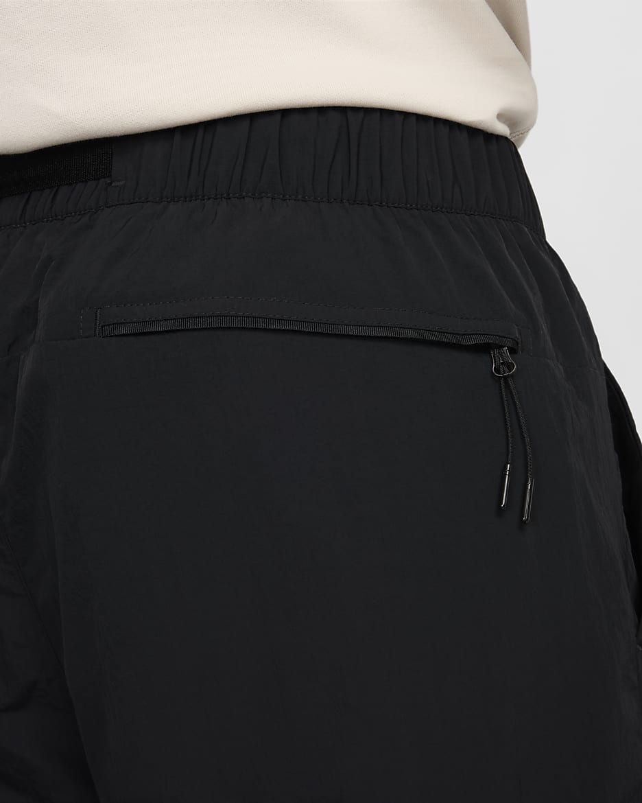 Pantaloni cargo in tessuto Nike Tech – Uomo - Nero/Nero