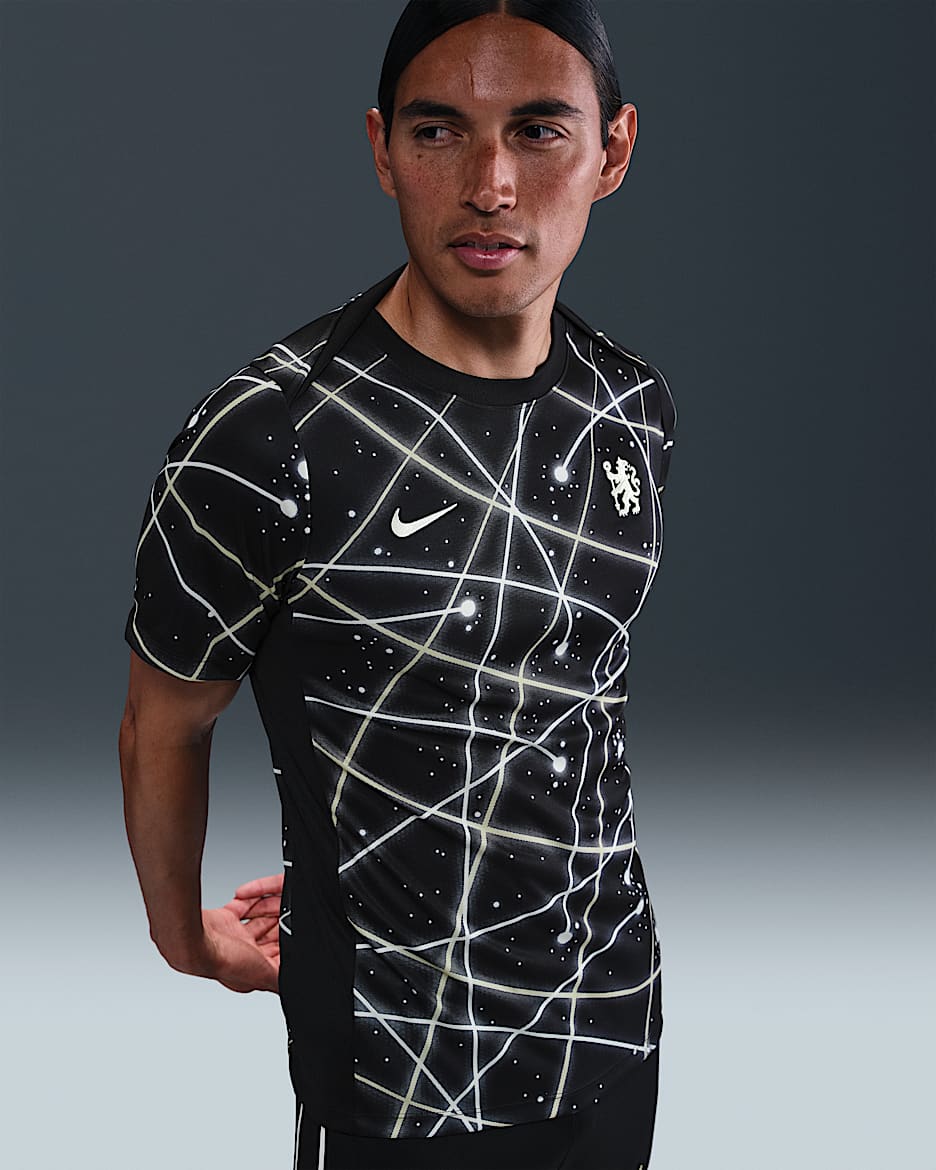 Chelsea FC Academy Pro Camiseta de fútbol de manga corta para antes del partido Nike Dri-FIT - Hombre - Negro/Coconut Milk/Team Gold/Coconut Milk
