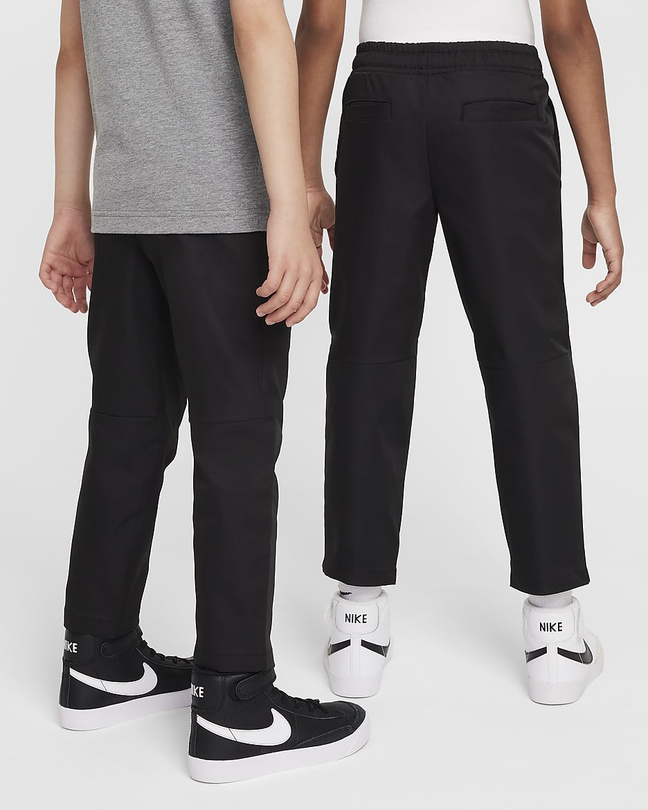 Pants de tejido Woven para niños talla pequeña Nike Dri-FIT - Negro