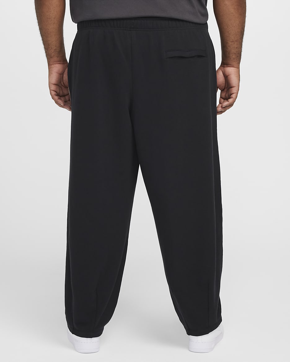 Pantaloni oversize in French Terry Nike Club Fleece – Uomo - Nero/Nero/Bianco