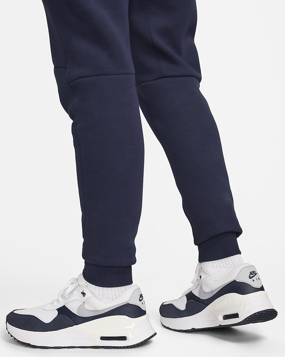 Chelsea F.C. Tech Fleece Men's Nike Football Joggers - Obsidian/Guava Ice