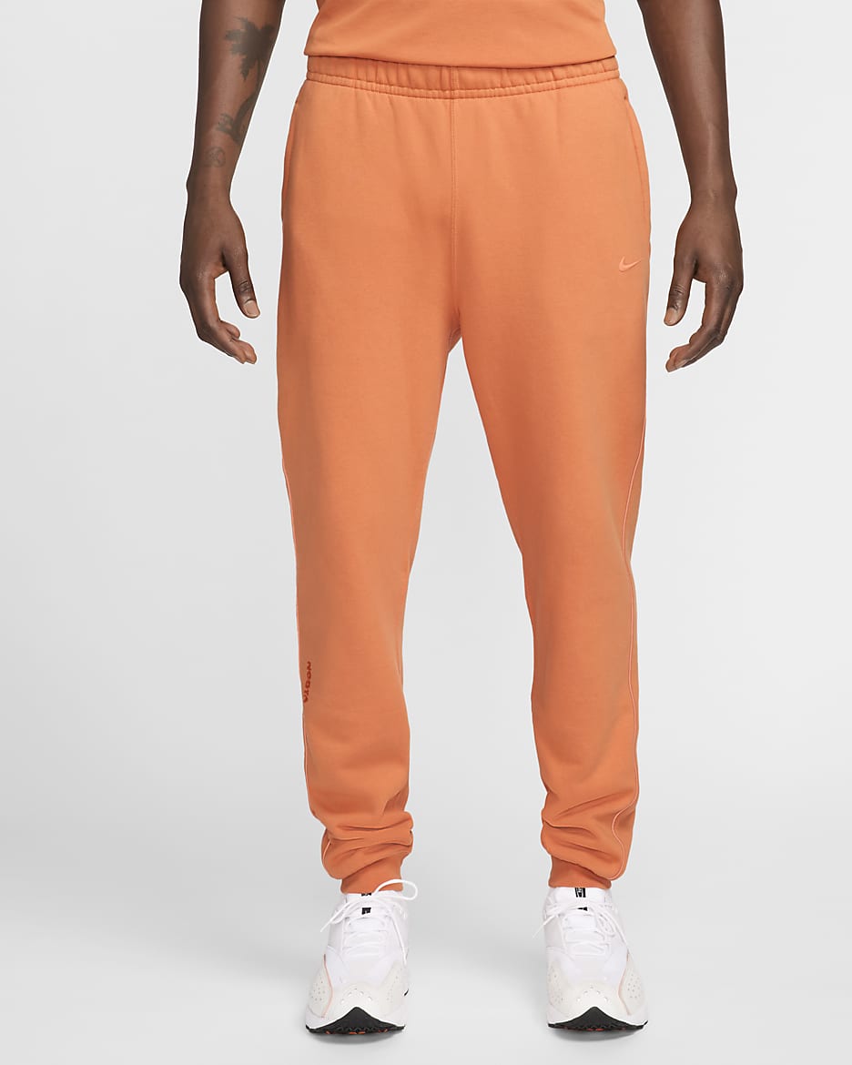 NOCTA NOCTA Fleece CS-sweatpants - Hot Curry/Orange Trance/Orange Trance