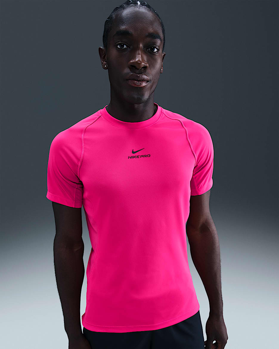 Haut à manches courtes Dri-FIT Nike Pro Training pour homme - Rush Pink/Noir