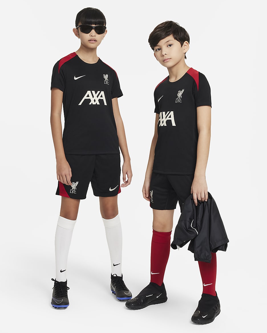 Liverpool F.C. Strike Older Kids' Nike Dri-FIT Football Short-Sleeve Knit Top - Black/Black/Gym Red/Light Orewood Brown