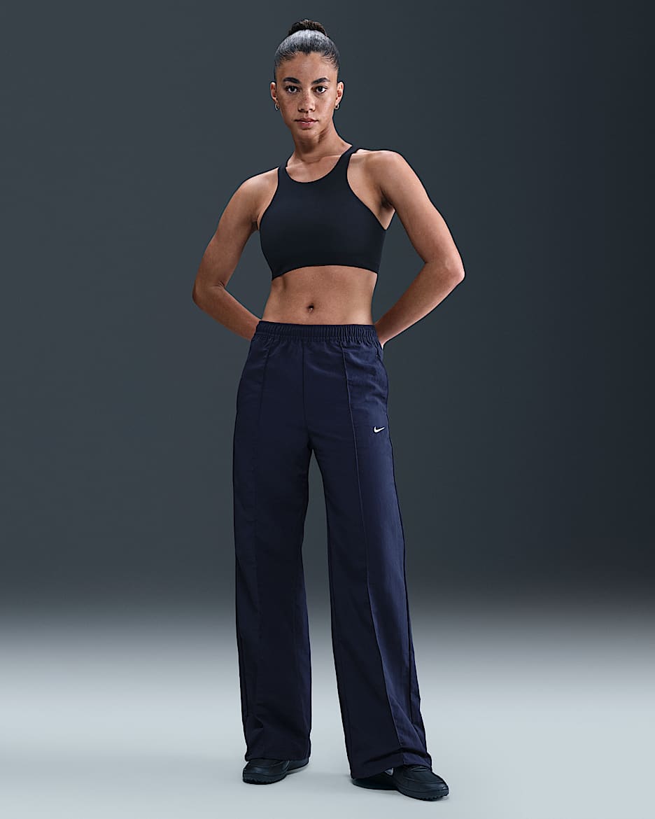 Nike Sportswear Everything Wovens Pants de tiro medio con dobladillo abierto para mujer - Azul marino medianoche/Vela
