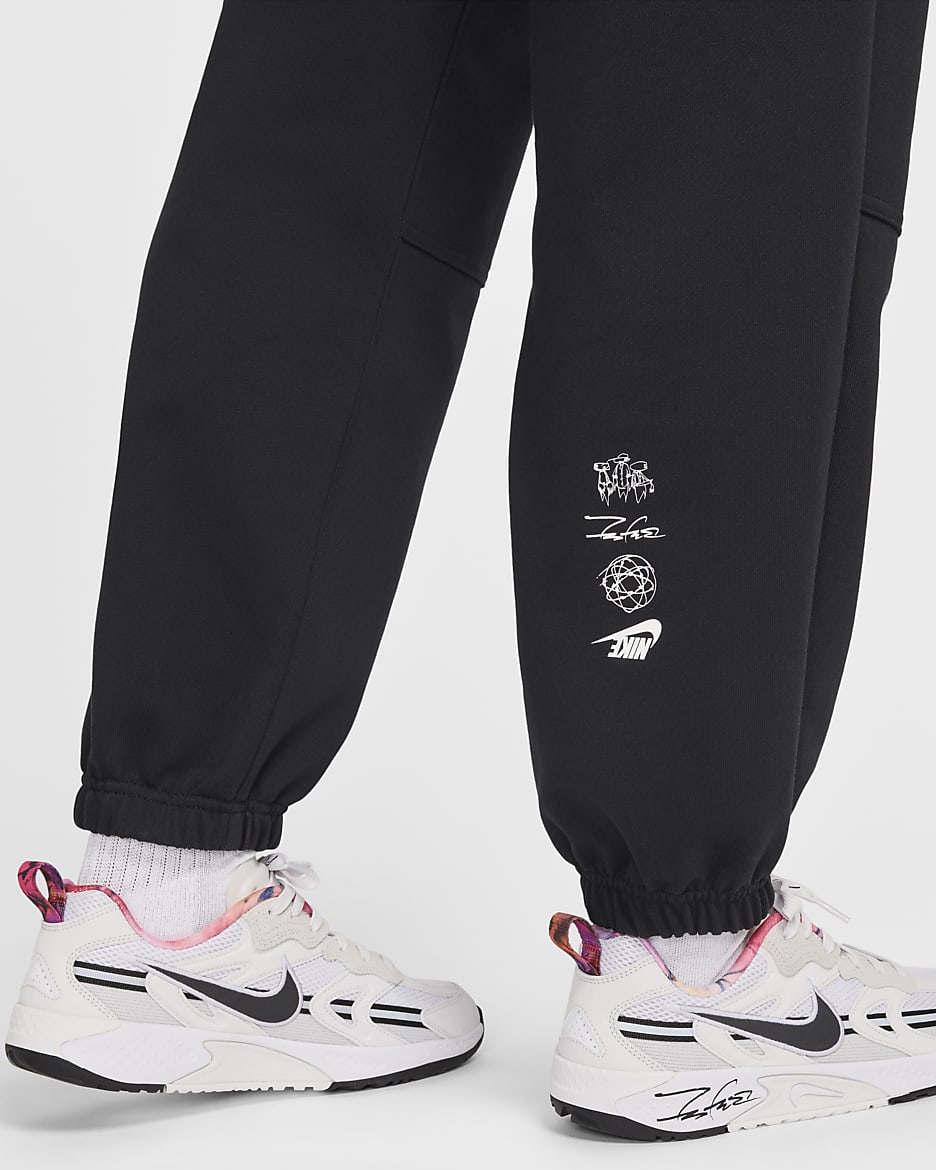 Nike Sportswear Breaking ekstra stor frottébukse med mellomhøyt liv til dame - Svart