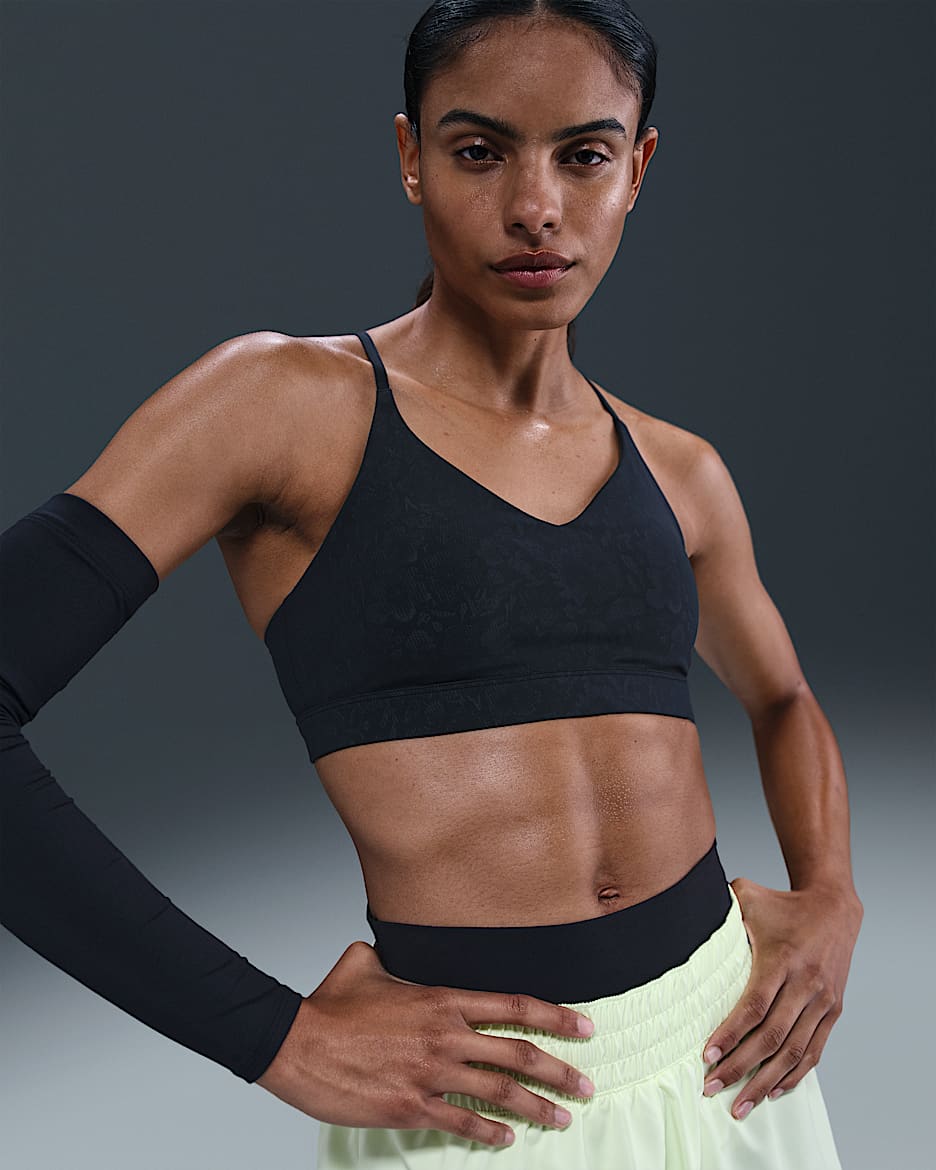 Bra deportivo con estampado floral con almohadillas para mujer Nike Indy Light Support - Negro/Antracita/Gris humo oscuro