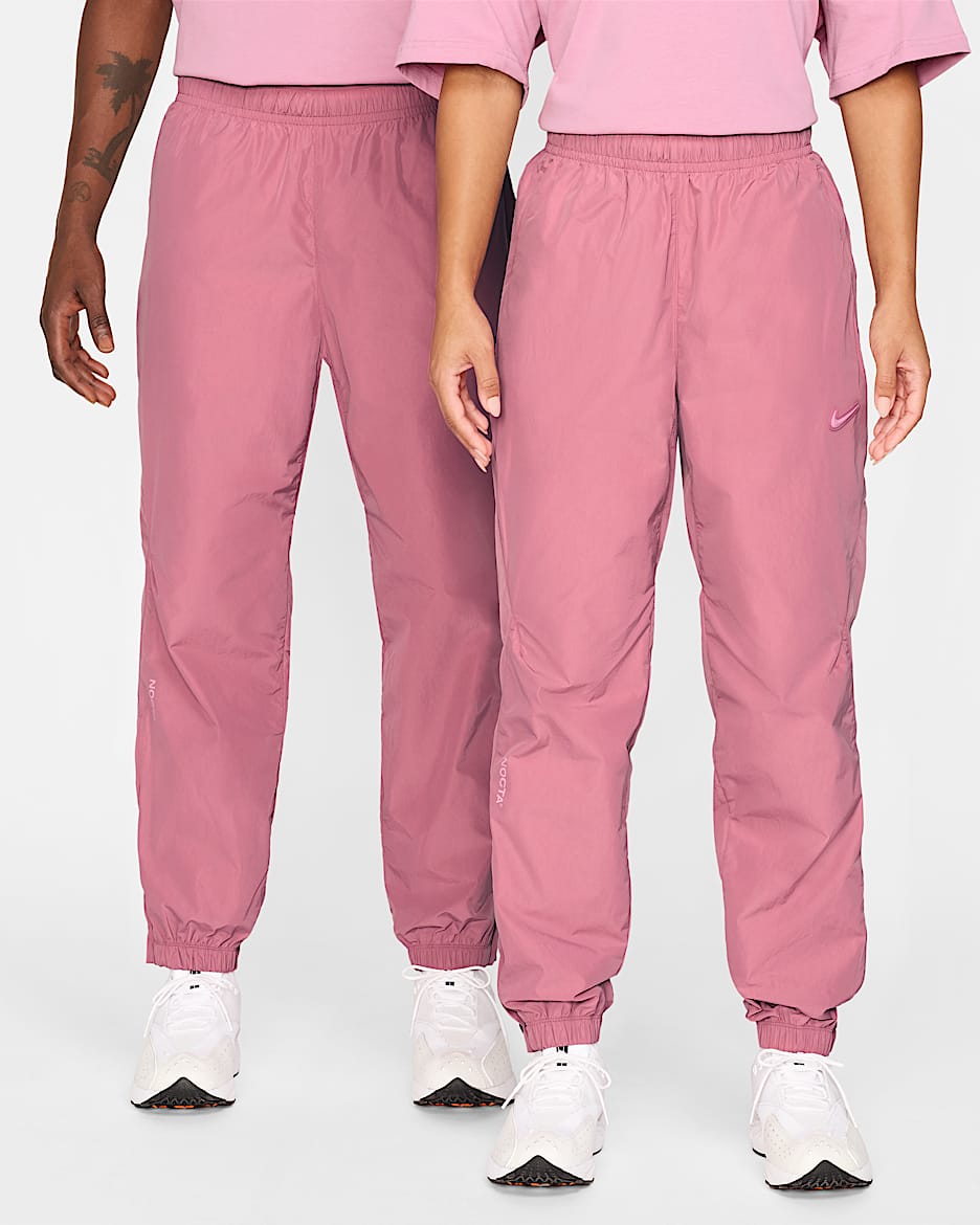 NOCTA Northstar nejlon melegítőnadrág - Desert Berry/Elemental Pink/Elemental Pink