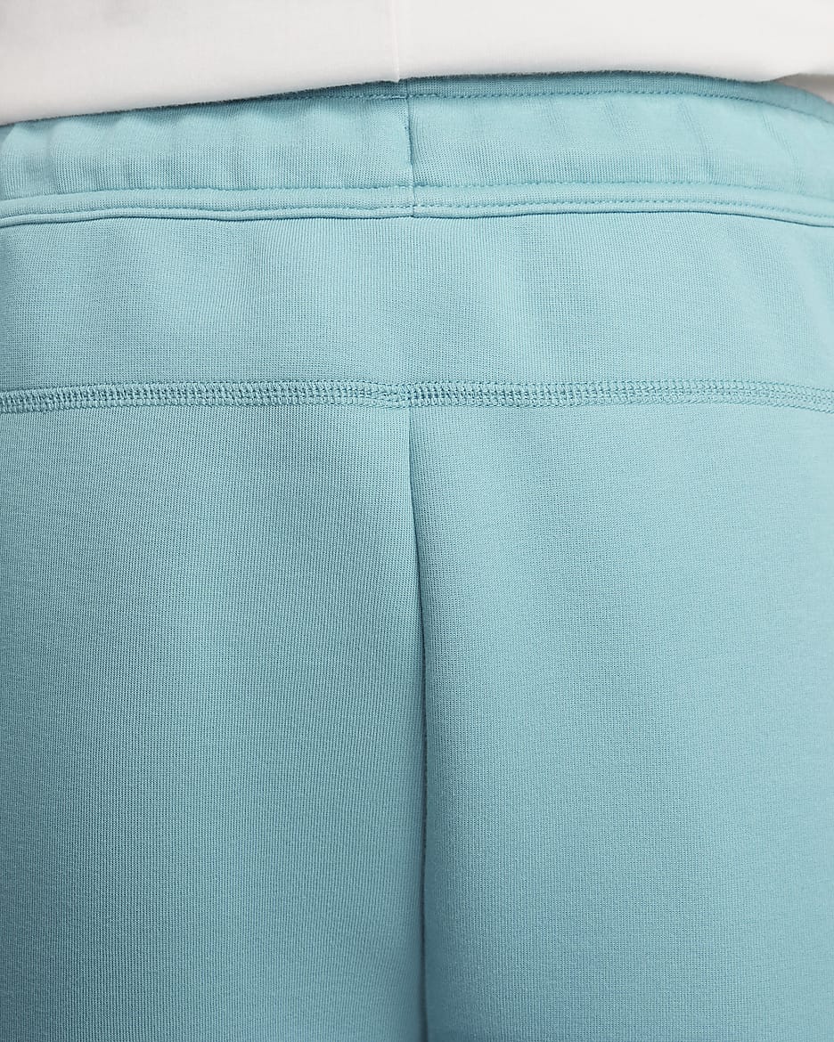 Joggingbyxor Nike Sportswear Tech Fleece för män - Denim Turquoise/Svart