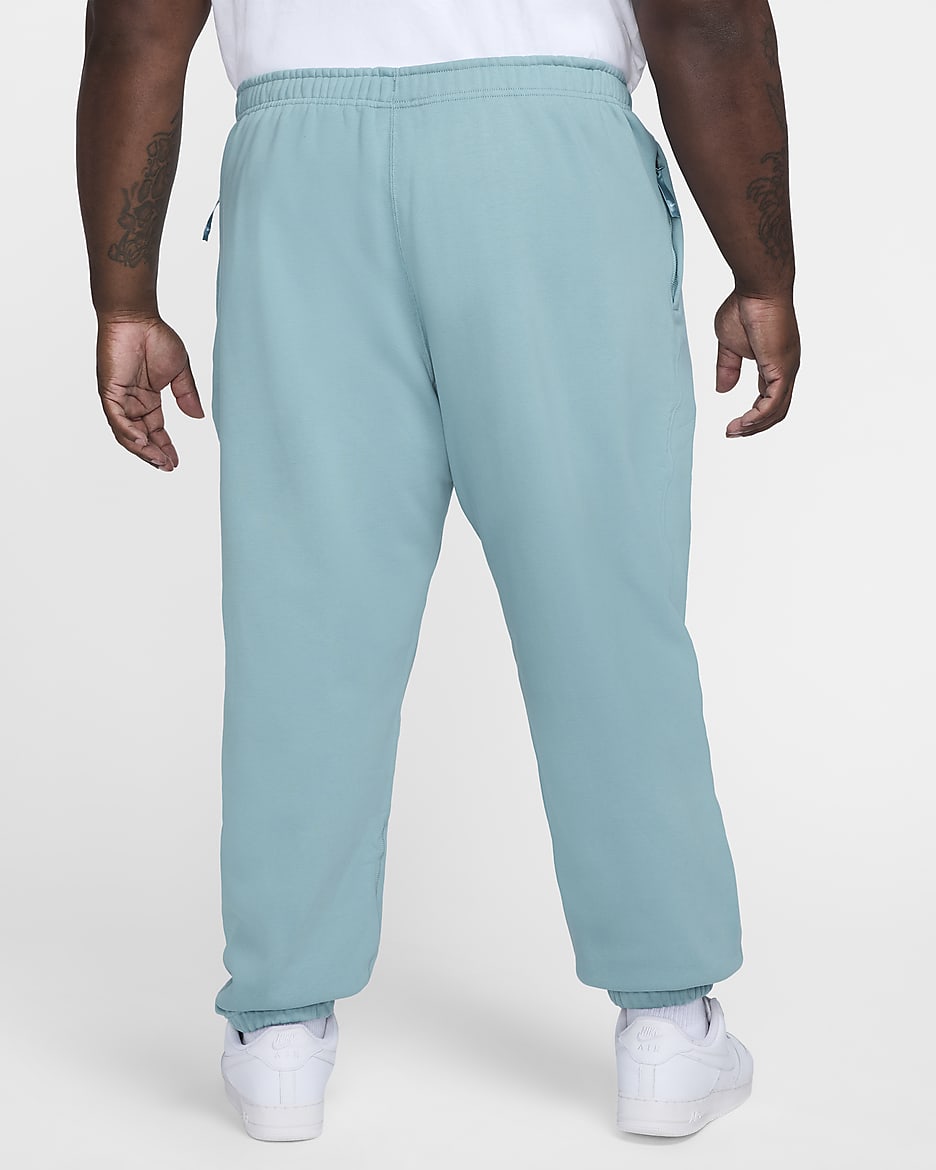 Pantaloni in fleece Nike Solo Swoosh - Uomo - Denim Turquoise/Bianco