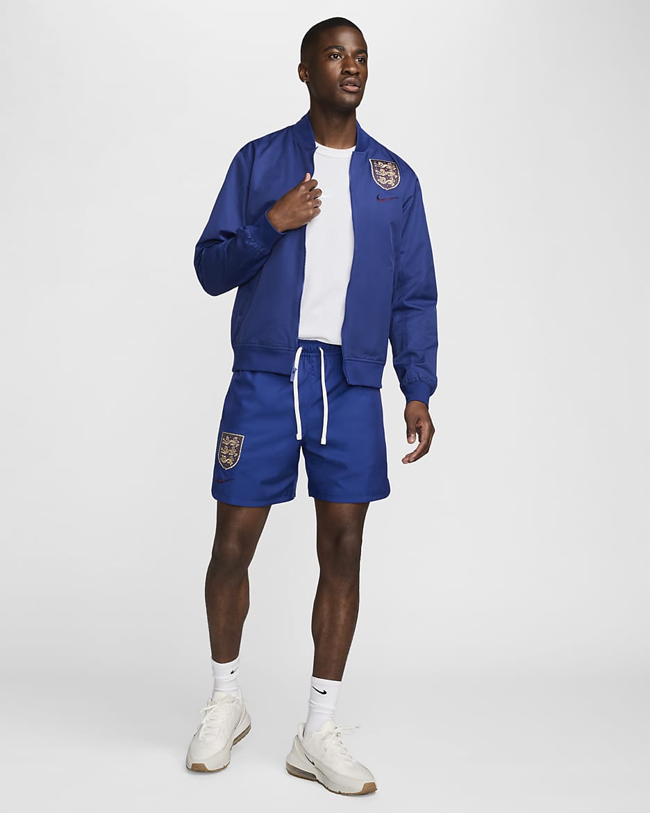 England Sport Essentials Men's Nike Football Woven Bomber Jacket - Deep Royal Blue/Deep Royal Blue/Sesame/Rosewood