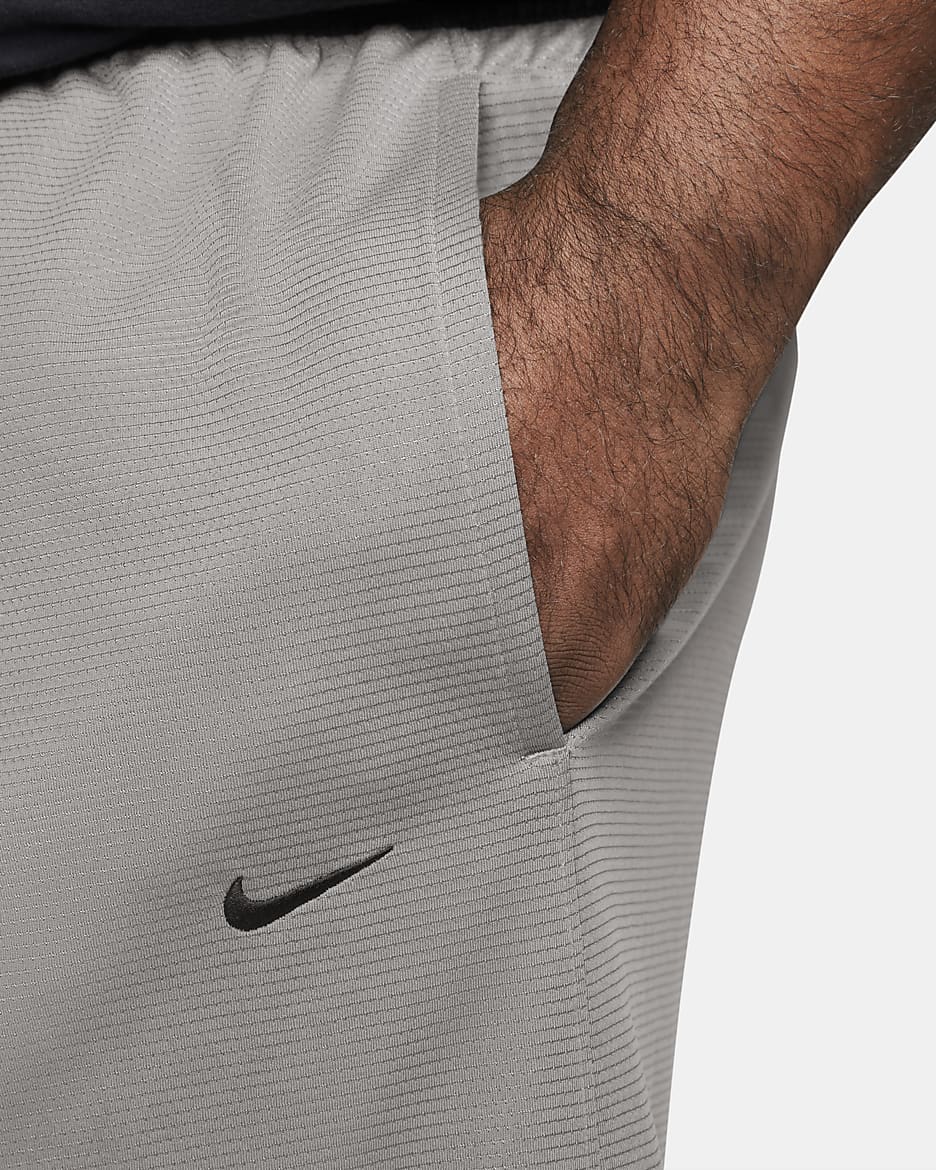 Shorts de básquetbol de 25 cm para hombre Nike Dri-FIT DNA - Gris azulado/Negro